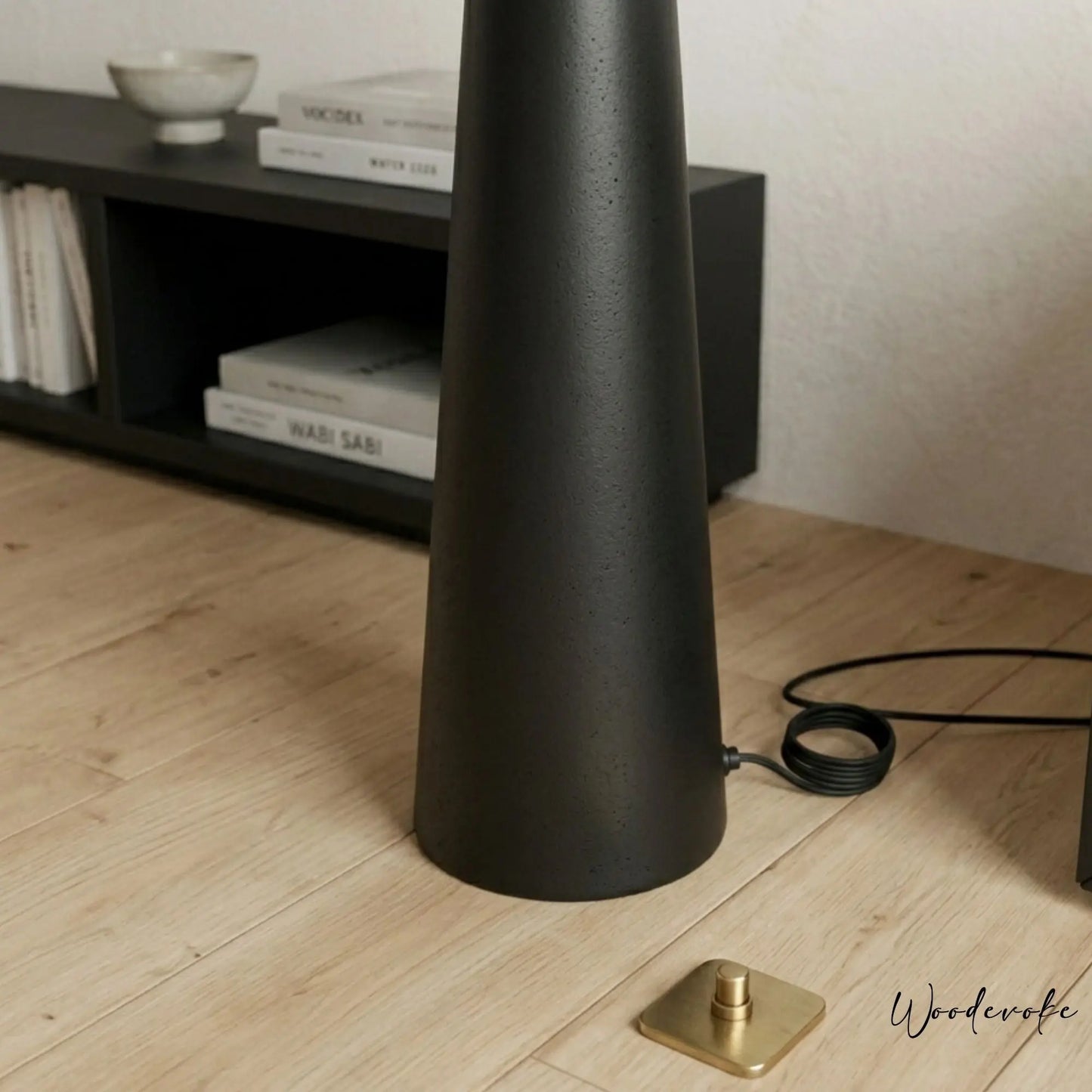 Black Nordic tapered wooden floor lamp side view — matte black solid wood standing lamp Wood Evoke