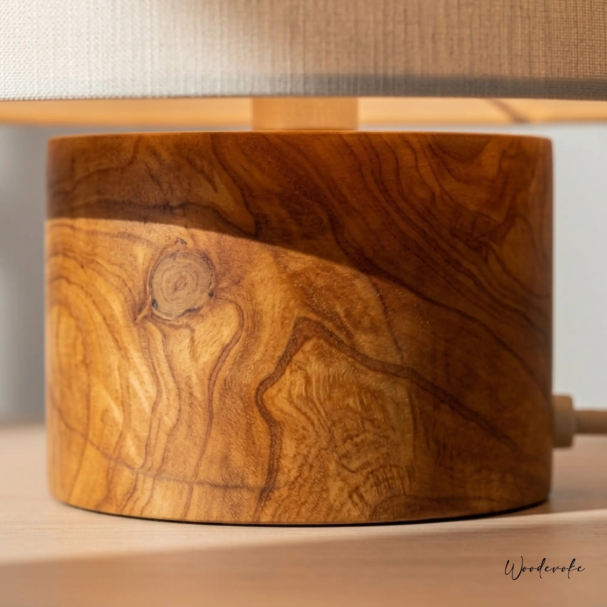 Rustic cylinder wooden table lamp side view — natural drum shade solid wood table lamp Wood Evoke