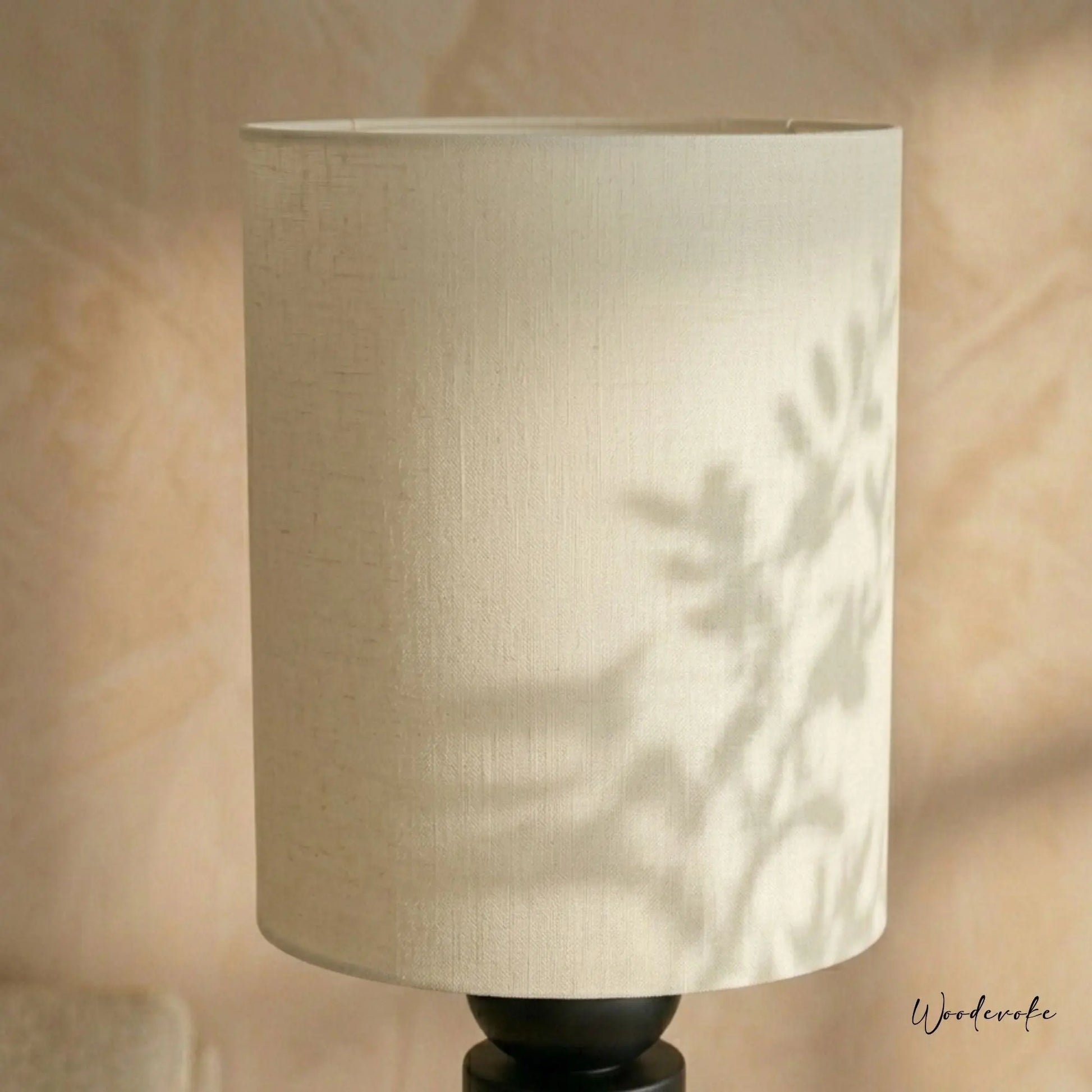 Black totem floor lamp in drawing room — premium wooden floor lamp for interiors Pakistan