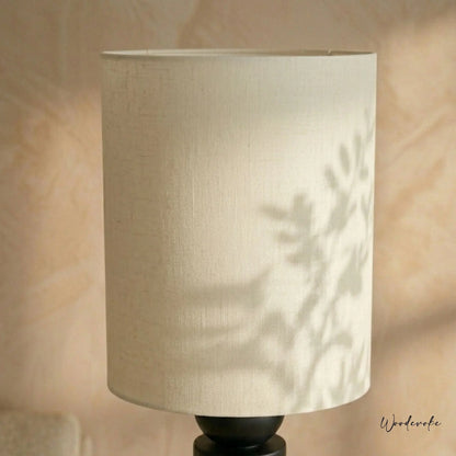 Black totem floor lamp in drawing room — premium wooden floor lamp for interiors Pakistan