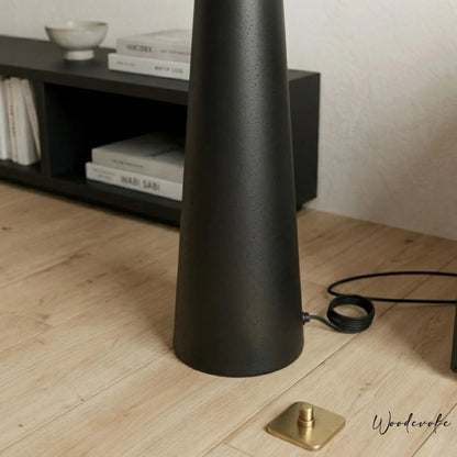 Black Nordic tapered wooden floor lamp side view — matte black solid wood standing lamp Wood Evoke