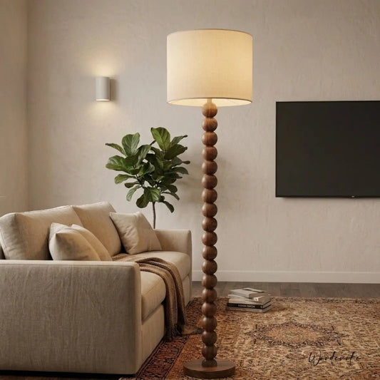 Handcrafted wooden floor lamp in living room — minimalist solid wood floor lamp Wood Evoke Pakistan